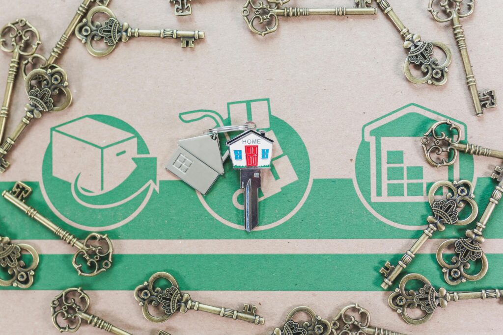 Silver and Green Padlock and Keys